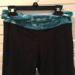 Black yoga pants with blue pattern stripe